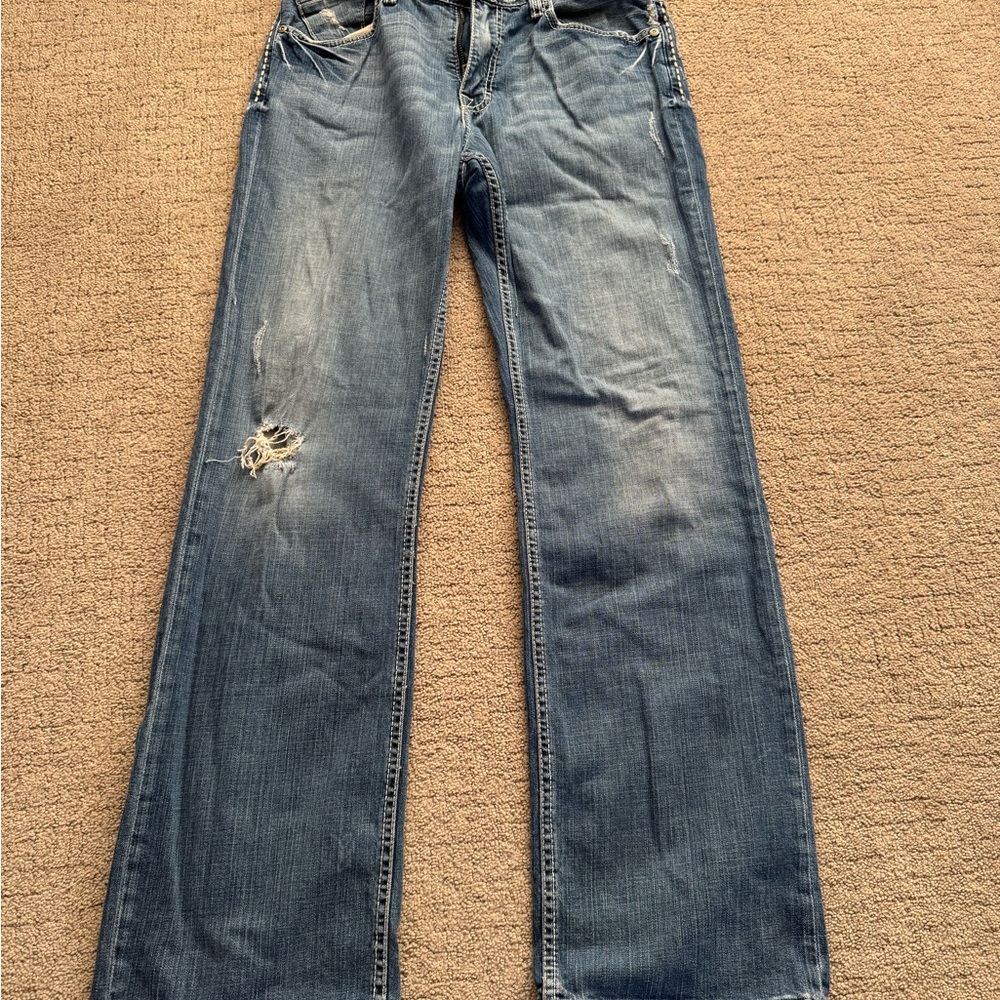 Distressed Blue Jeans